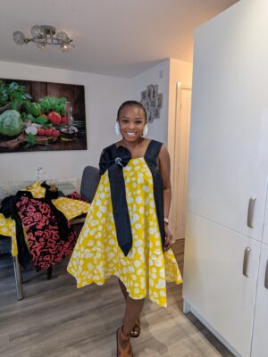 2026/07/1001652283-scaled.jpg Adanna Ankara Yellow and Black Bow Dress